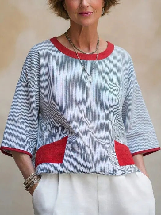 Loose-fit Casual Linen Top Featuring Blue-and-white Fine Vertical Stripes, A Round Neck, Three-quarter Sleeves, And Contrasting Red Piping