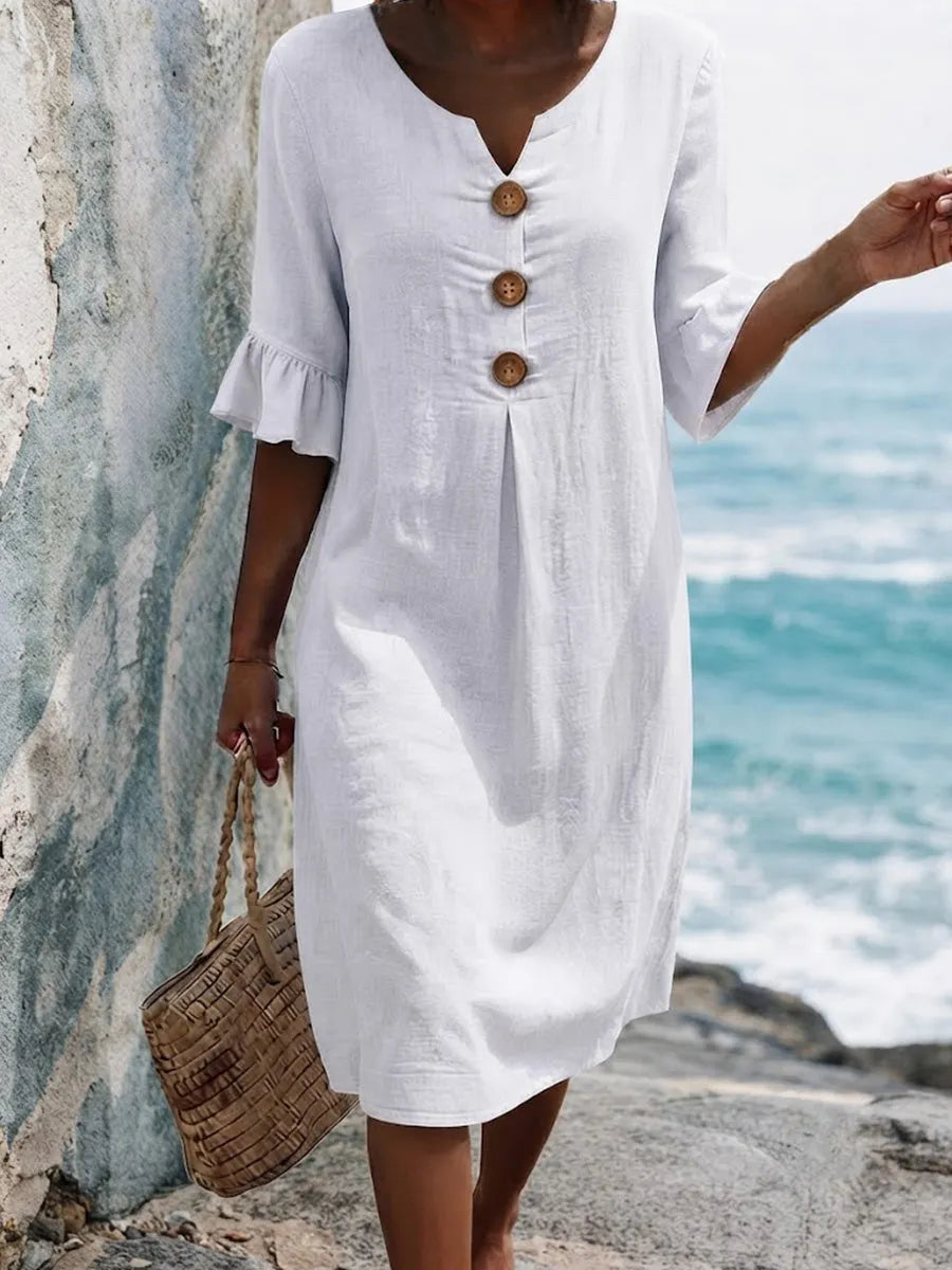 Solid-color Cotton Dress Featuring A V-neck, Three Wooden Buttons, Front Pleats, And Flattering Ruffled Mid-length Sleeves